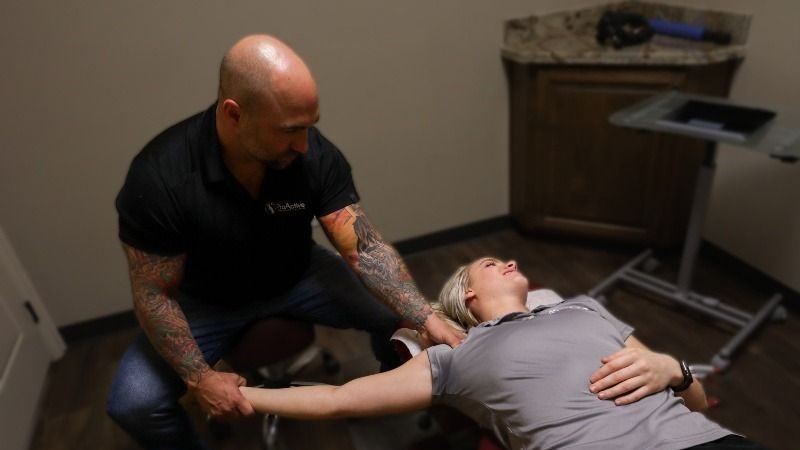 Chiropractor performing a spinal adjustment at ProActive Chiropractic and Wellness